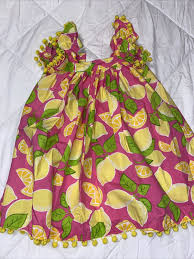 yellow lemon print dress pom pom trim