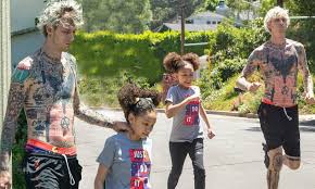 Mgk gave fans a glimpse of all his tattoos as he went shirtless for the run with his daughter and his assistant following behind, even showing off the tattoos on his legs in a pair of shorts. Machine Gun Kelly Goes For A Jog With His Daughter Casie 11 Amid Lockdown Daily Mail Online