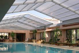 Why choose openaire's retractable roofs for your new indoor pool design? Swimming Pool Design Tag