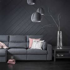 combinar los cojines con un sofá gris