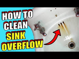 how to clean a sink overflow drain