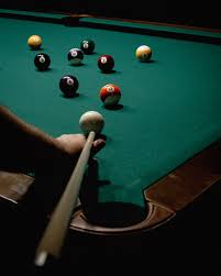 person playing billiards free stock photo