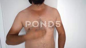 man shows tan lines on his hairy body, s... | Stock Video | Pond5
