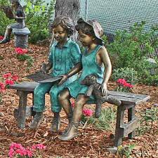 Bronze Boy And Girl Reading Book Statue