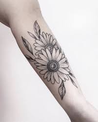 In christianity, daisies are associated with jesus christ and the virgin mary. Best 100 Daisy Tattoo Designs In 2021 Tattoo Stylist