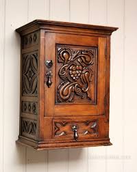Carved Fruitwood Wall Cabinet