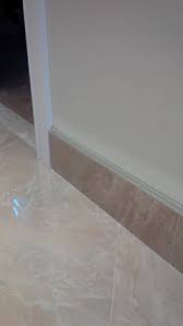 wood or tile baseboard in bathrooms