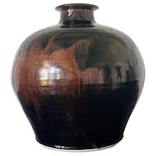large ceramic jar with tenmoku glaze by