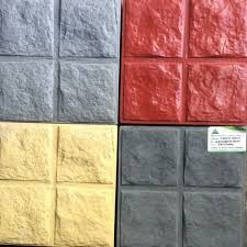 red yellow concrete cobble stone tiles