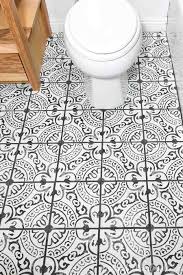 laying floor tiles in a small bathroom