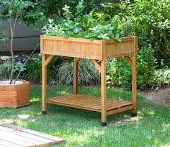 Building a raised garden bed on wheels. Gardening On Concrete With Raised Beds And Patio Containers Eartheasy Guides Articles Eartheasy Guides Articles