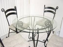 Glass And Wrought Iron Table And Chairs