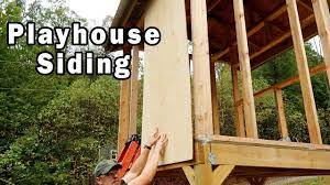 install t1 11 siding on the playhouse