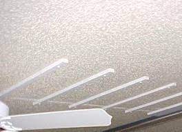 cleaning a textured popcorn ceiling