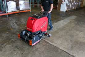 how to operate a floor scrubber
