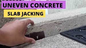 How To Raise Sunken Or Uneven Concrete. Slab Jacking. - YouTube