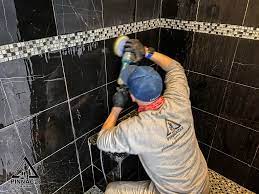 black marble tile shower restoration
