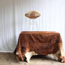 diy cowhide as table covering