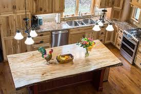 a rustic hickory kitchen with live edge