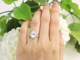 Classic oval halo engagement ring. 22 Oval Halo Engagement Rings We Re Eyeing Right Now Who What Wear