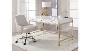The desk has a pullout keyboard. Marabella Glossy White Writing Desk Gold Legs