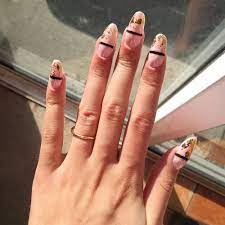fake nails can break your nail biting habit