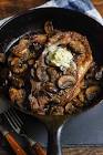 baked rib eye steaks with mushrooms