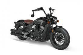 on road of indian scout bobber in