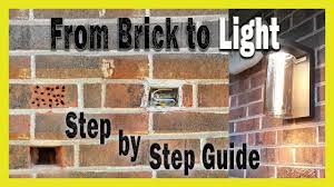 mounting exterior light through brick