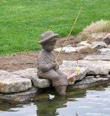 Boy Fishing Statue In Statues Lawn
