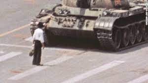Once the moving tanks reached a complete stop in front of him, the tank man waved his right hand as if to tell the vehicles to turn back. Microsoft Blocked Tiananmen Square Tank Man Images From Bing Search Deadline