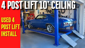 car lift install in a home garage