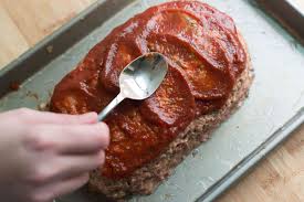 for a perfectly browned crust i form the meatloaf by hand and bake on a