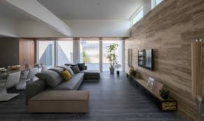gray floor living room with brown walls