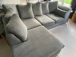 plush velvet sofa available in corner