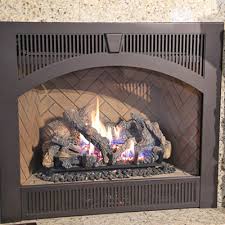 freestanding stove vs fireplace insert