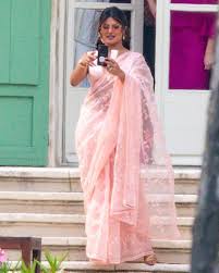 cee in her baby pink saree is the
