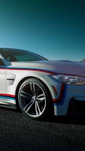 bmw m4 coupe white car side view
