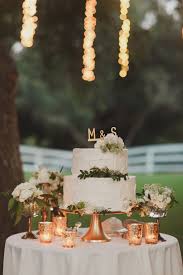 Wedding cake tables should be decorated simply so as not to detract from the. Simply Tasteful Wedding Wedding Cake Table Decorations Wedding Cake Table Wedding Cake Display