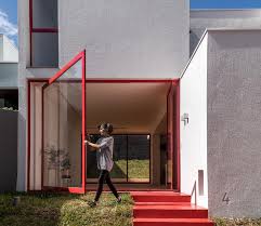 Large Pivoting Window Opens This House