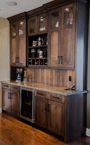 This shaker style bar created using homecrest cabinetry and floating shelves. Mini Bar Wall Novocom Top