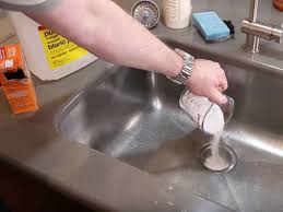 unclog a garbage disposal with baking soda