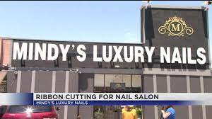 new nail salon holds ribbon cutting