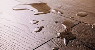 how to dry laminate flooring with water