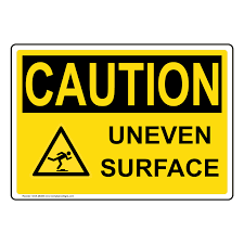 caution sign uneven surface osha
