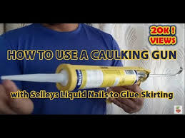 how to use a caulking gun with
