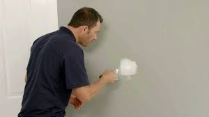 how to fill holes in plasterboard uk