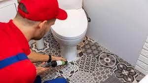 how to fix a wobbly toilet why it creaks