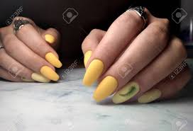 A matte finish makes a regular red nail look a little stronger and really durable, falcone adds. Long Round Nails With Gel Polish Yellow Nails With Matte Finish Stock Photo Picture And Royalty Free Image Image 138552392