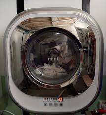 Our extensive collection of washing machines includes models to suit any need or budget, regardless of whether you are shopping for a washer dryer or a mini washing machine. Daewoo Mini Washer In Use Doesnt Look That Mini But Still Cool Mini Washer And Dryer Small Washing Machine Camper Hacks